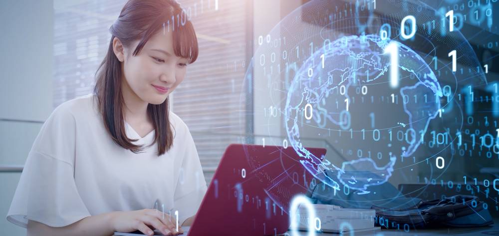 Woman typing on a laptop