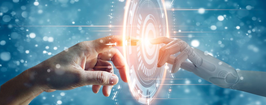 A human hand touching a robot hand