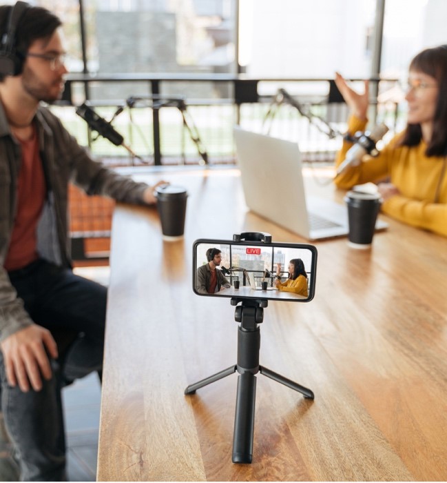 Two people doing a podcast