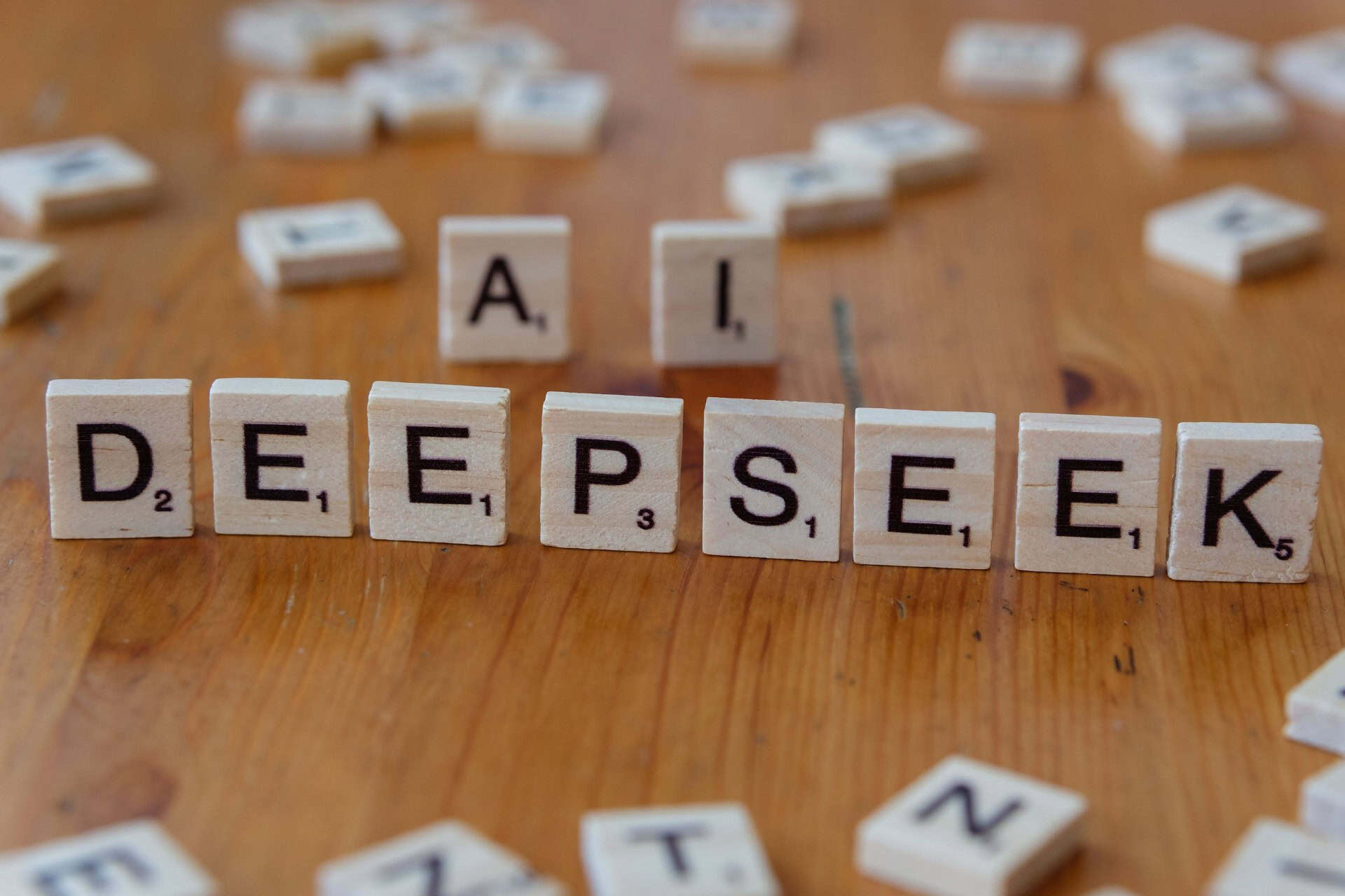 Scrabble pieces spelling out AI DeepSeek