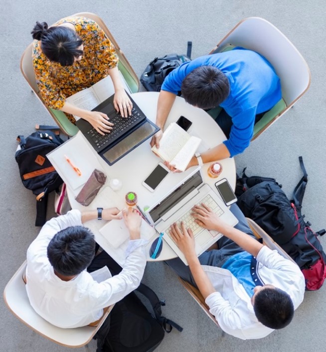 Students sitting around a table